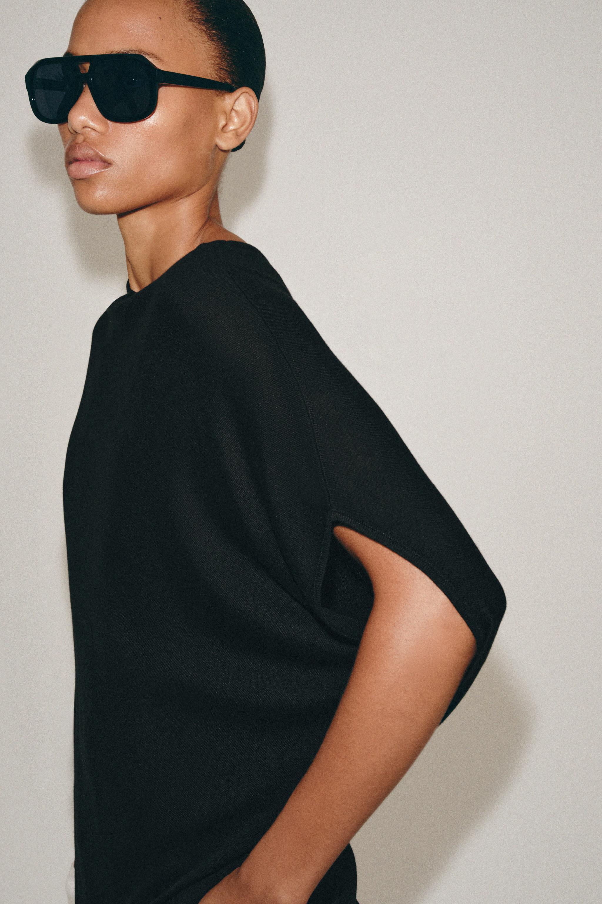 ASYMMETRIC KNIT TOP